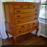 F27. Maddox Fables maple highboy. 56”h x 35”w x 17”d - $350 